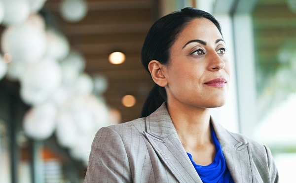 business woman looking outside