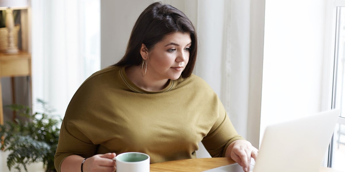 woman in office sitting at desk