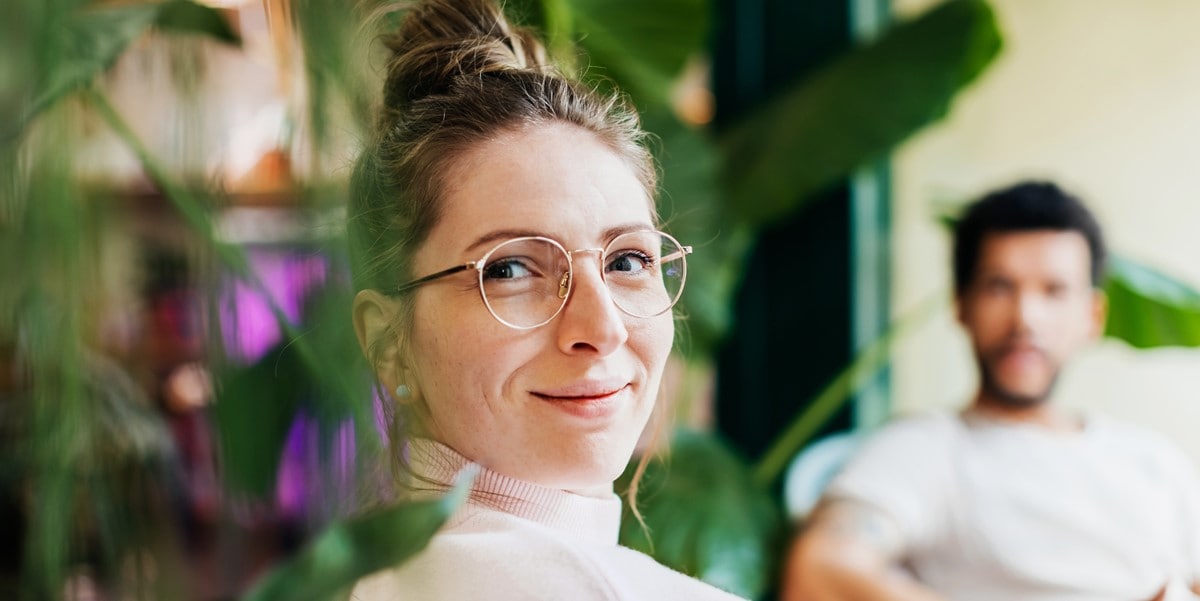 woman smiling, in the office